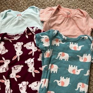 Short sleeve body suit set of 4